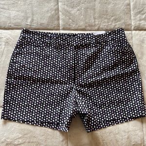 White House Black Market shorts with tags. Black with white & purple. Size 14.